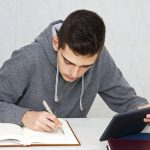 young man studying at home, lifestyle