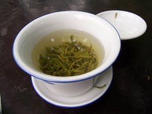 Step away from the coffee. Green tea supplies caffeine too, but also supplies nootropic L-Theanine to help minimize caffeine jitters & nervousness. By McKay Savage from London, UK (China - Chengdu 22 - green tea) [CC BY 2.0], via Wikimedia Commons